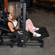 Woman using hip thrust machine