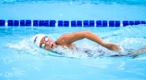Woman swimming in pool