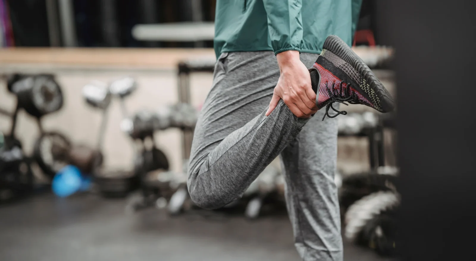 Person stretching at a gym