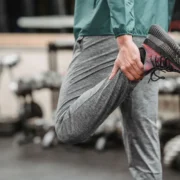 Person stretching at a gym