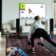 woman working out with F45 at home on a Samsung TV