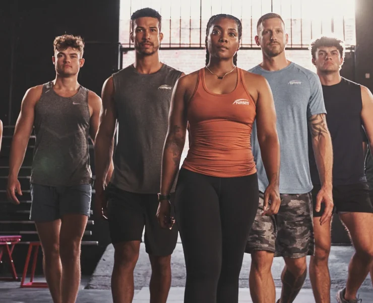 Group of fit people looking at camera