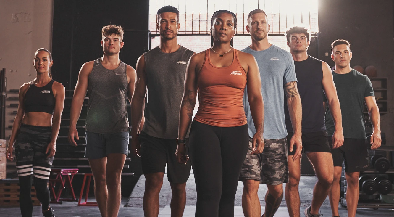 Group of fit people looking at camera