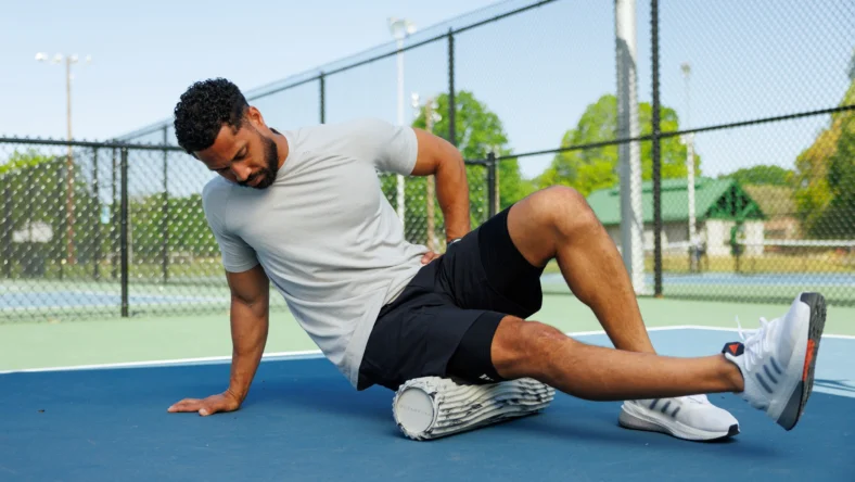 an image of a man using an oceanfoam roller