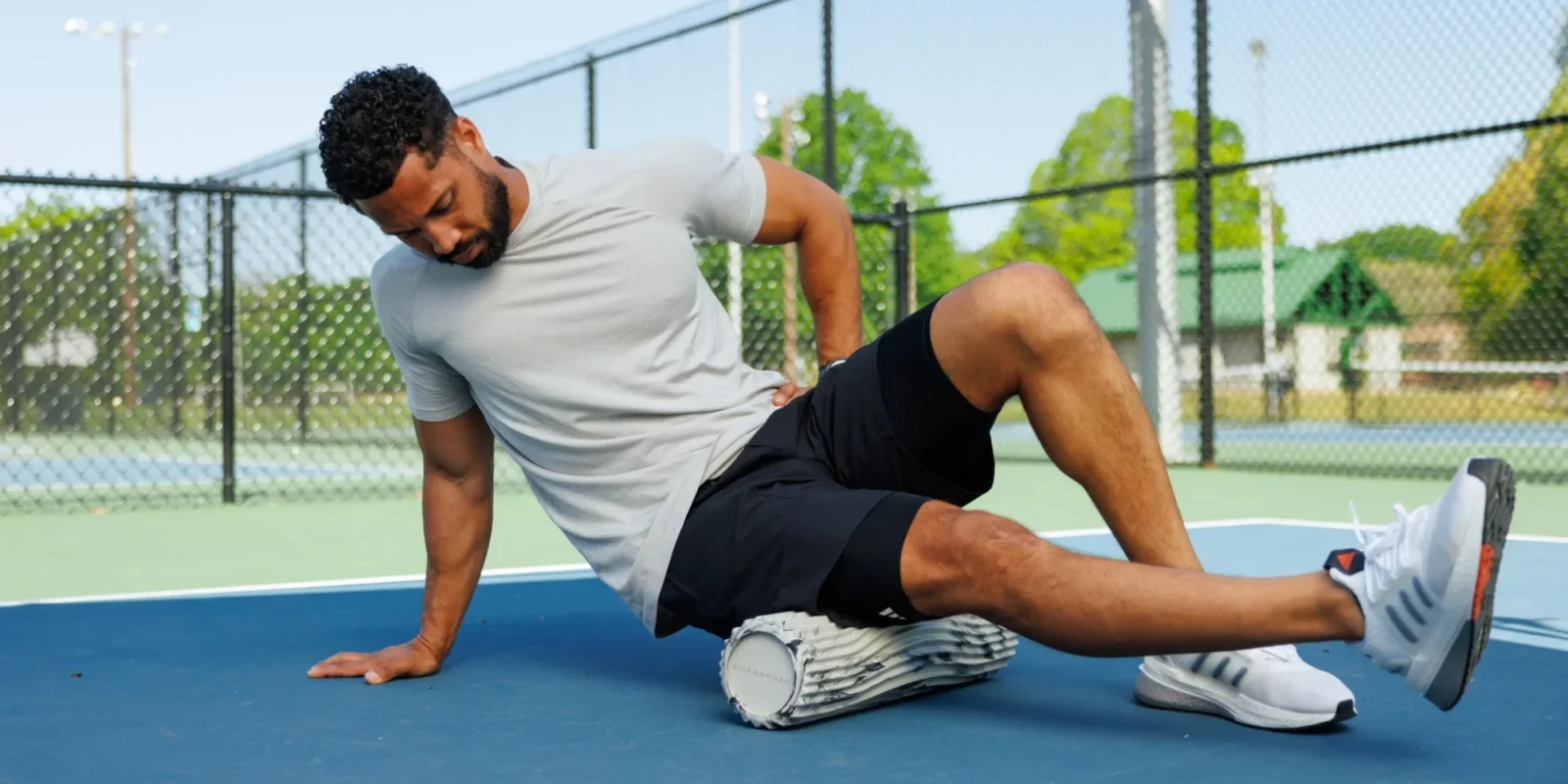 an image of a man using an oceanfoam roller