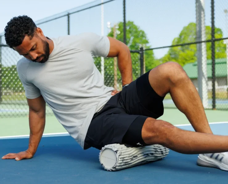 an image of a man using an oceanfoam roller