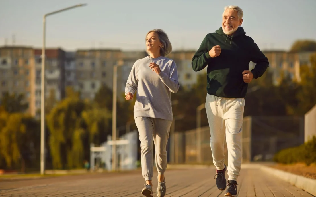 Older people running outside