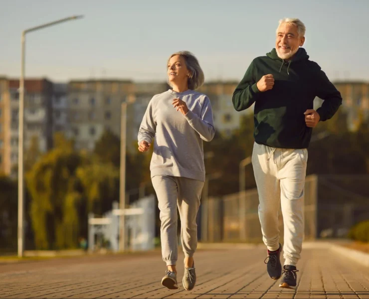 Older people running outside