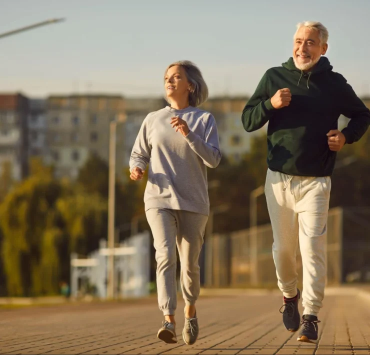 Older people running outside