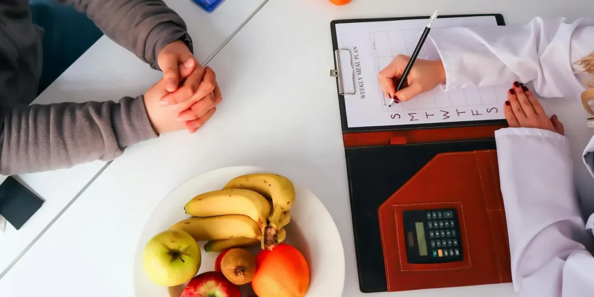doctor writing diet plan