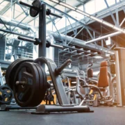 weight stack on the floor of a large gym