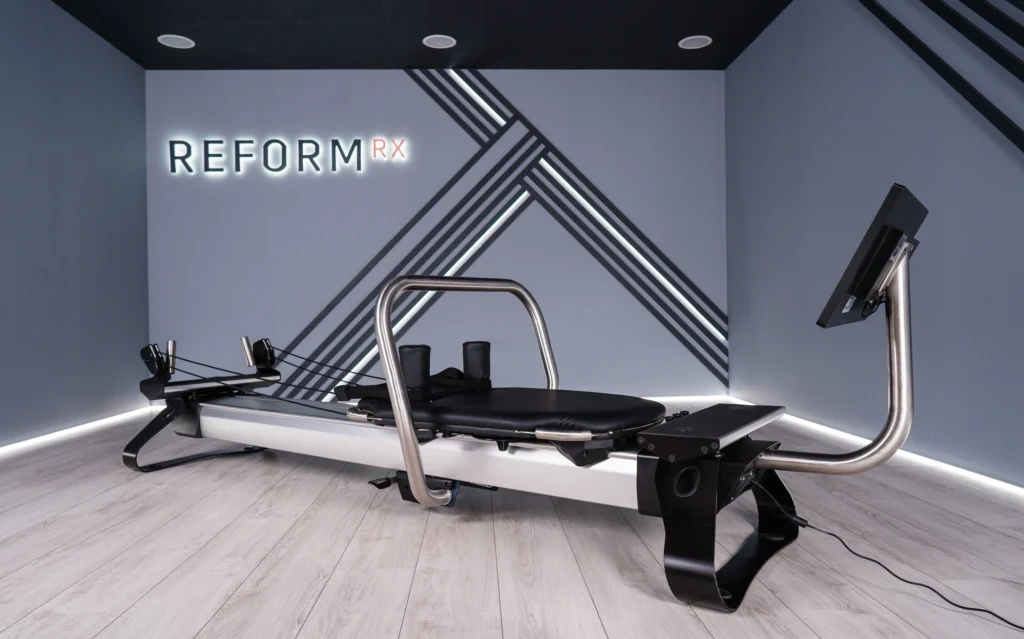 wide shot of an Reform RX Pilates reformer