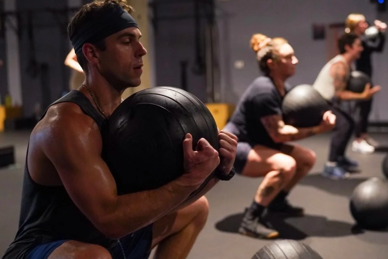 a man working out at MADabolic Asheville