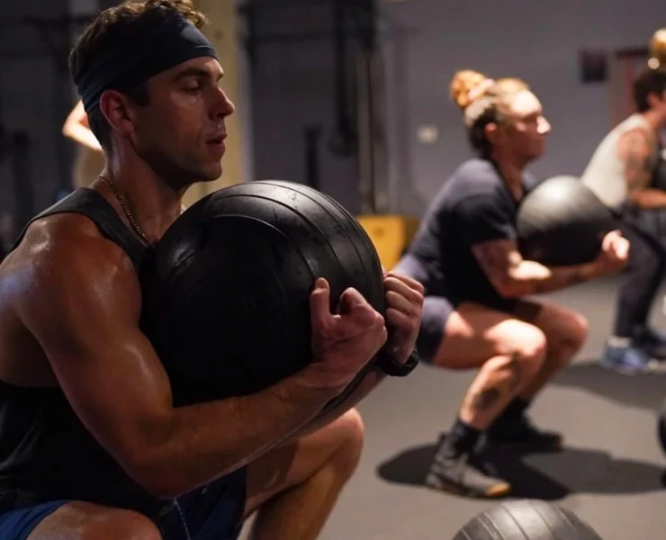 a man working out at MADabolic Asheville