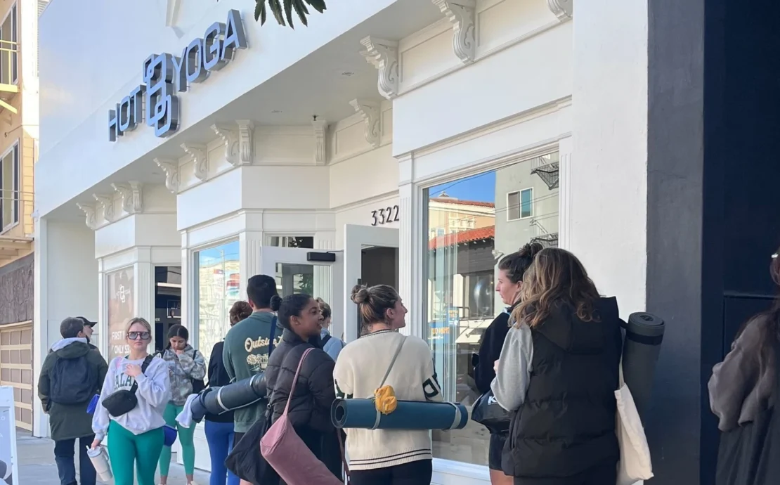 a line outside Hot 8 Yoga's new location in San Francisco