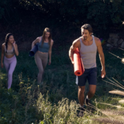 an image of people with yoga gear in the outdoors