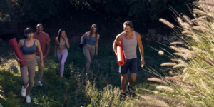 an image of people with yoga gear in the outdoors