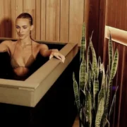 a woman sitting in a Pause Studio tub