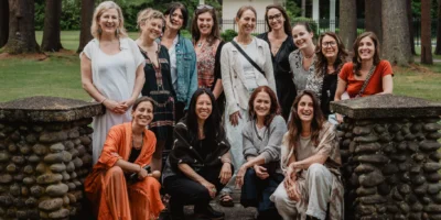 a smiling group of Heallist healers and wellness practioners