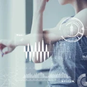 young woman stretches while pop-up data graphics appear in front of her