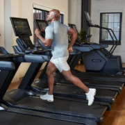 man running on treadmill