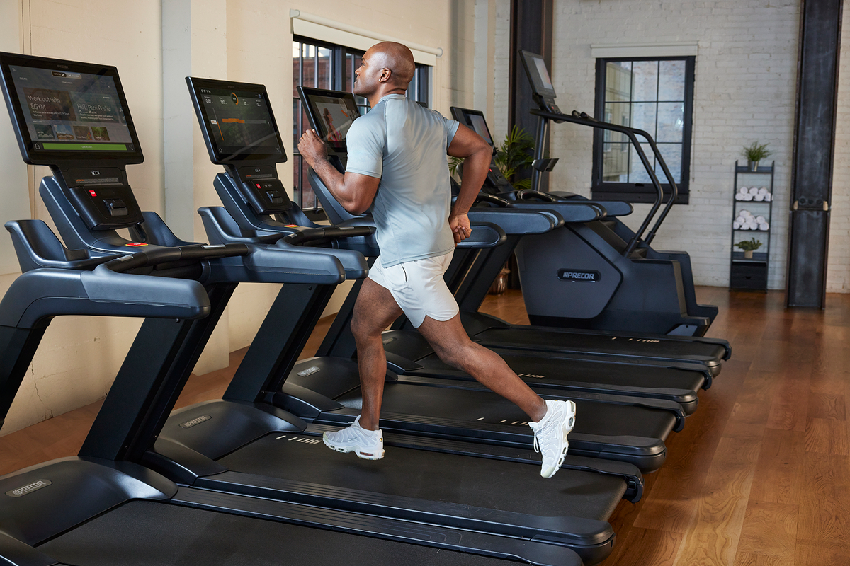 man running on treadmill