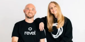 a smiling headshot of Revel owners