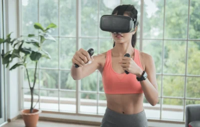 woman works out wearing a virtual reality headband