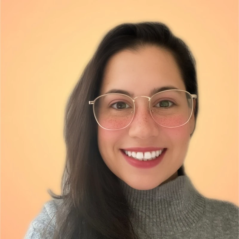 a smiling headshot of Caitlin Shure, PhD.