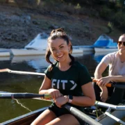 woman rows wearing an iFIT shirt