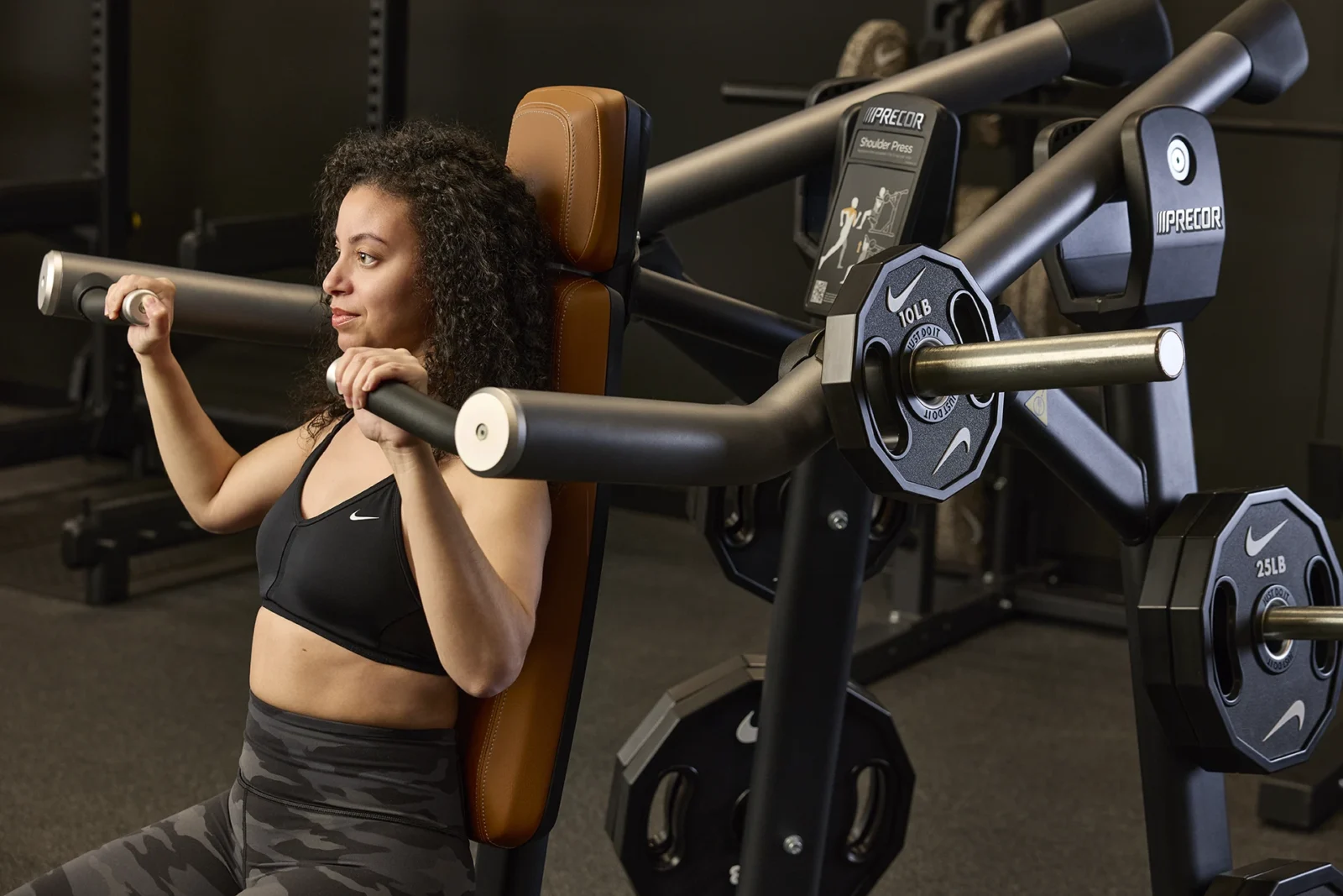 woman works out with Nike equipment and clothing