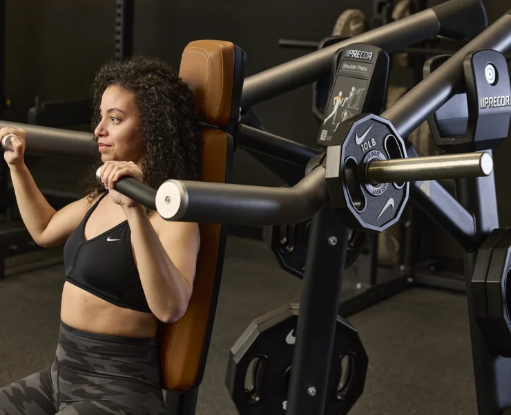 woman works out with Nike equipment and clothing