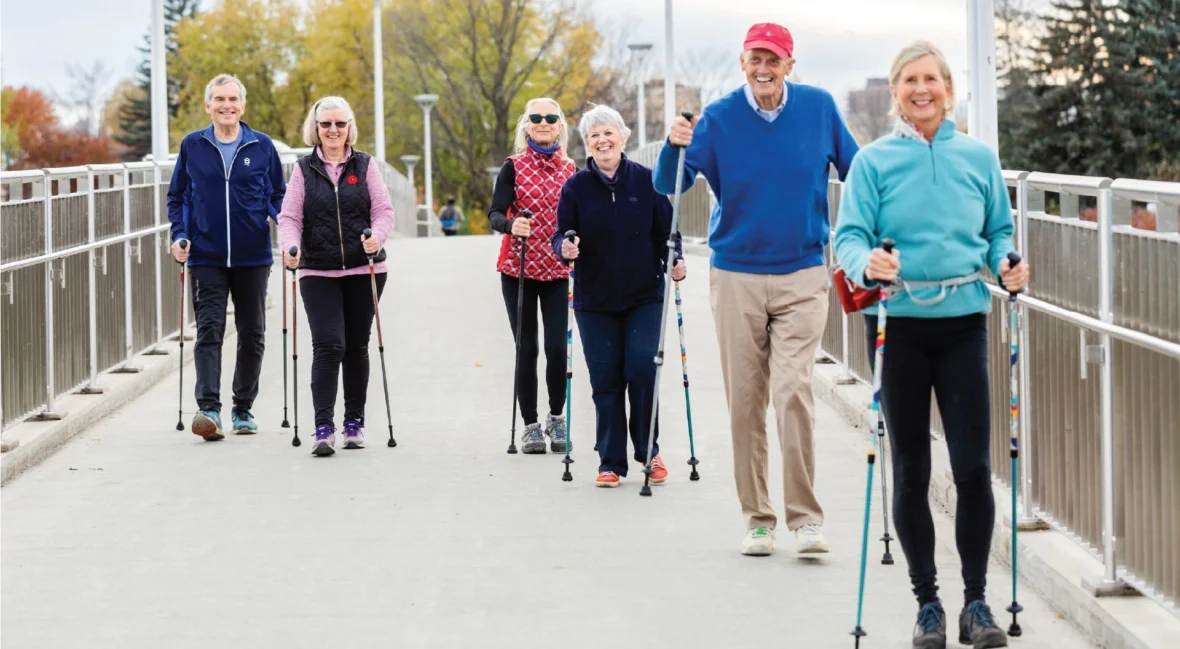 older people walking with poles