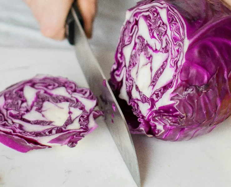 woman cutting cabbage/healthy eating