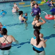 a group of Water Wings members in a pool