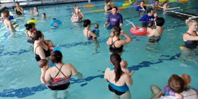 a group of Water Wings members in a pool