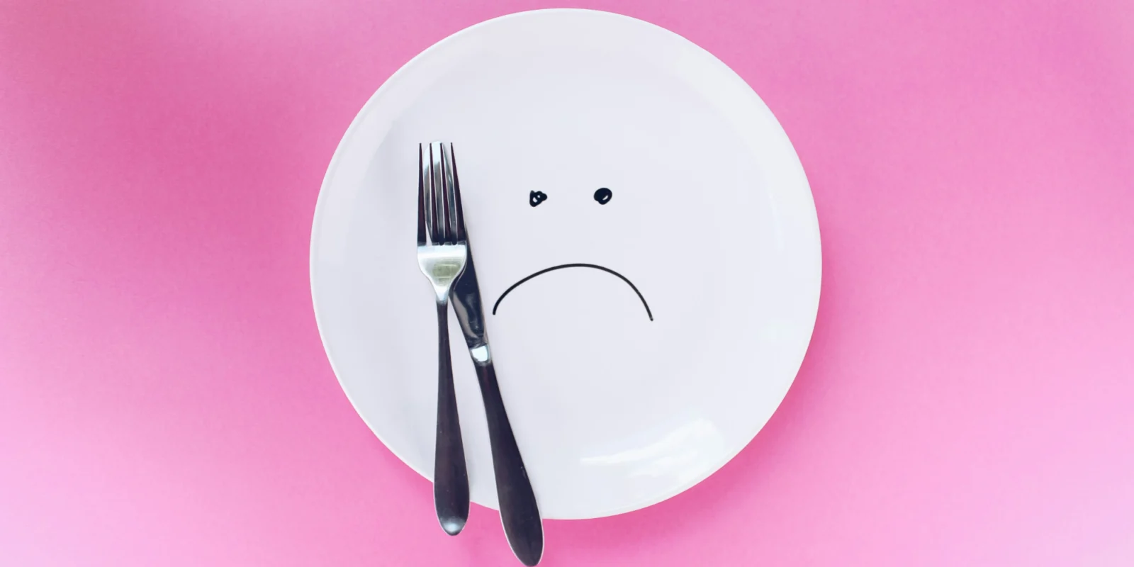 a dinner plate with a frown