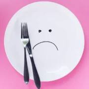 a dinner plate with a frown