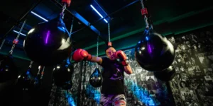 man hits a boxing bag