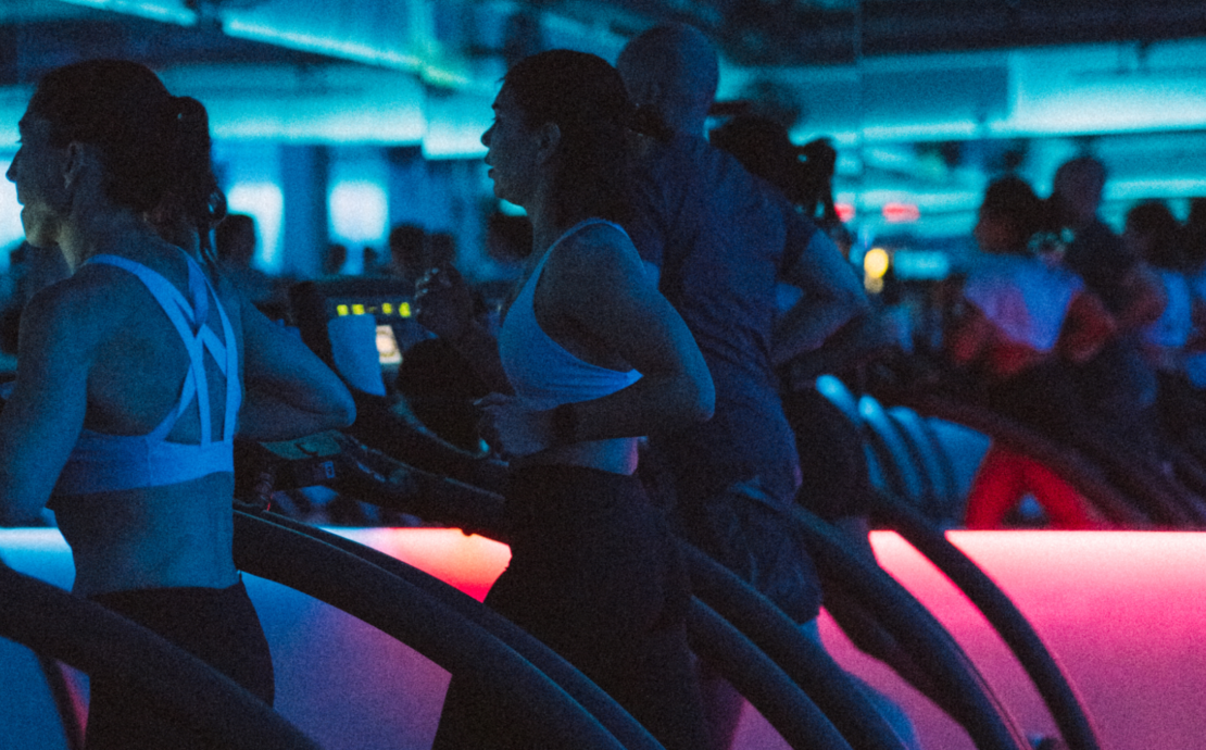 an interior shot on Mile High Run Club and members on treadmills