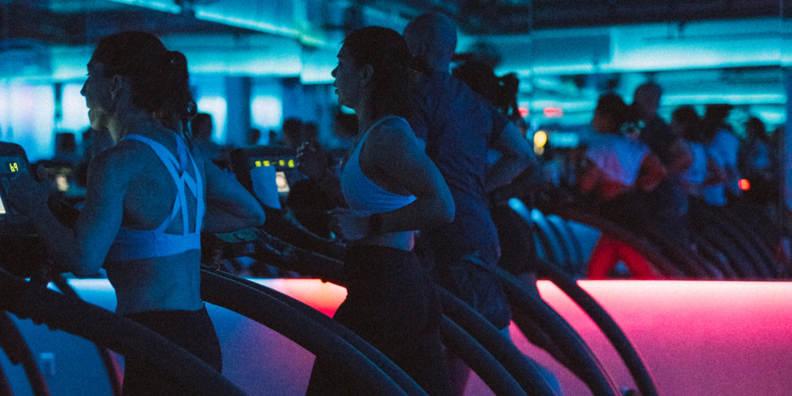 an interior shot on Mile High Run Club and members on treadmills