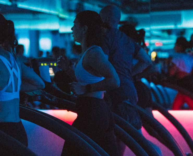 an interior shot on Mile High Run Club and members on treadmills