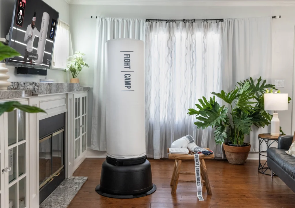 FightCamp boxing bag inside a living room