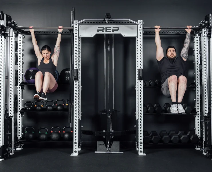 Two people working out on a Hyperion from REP Fitness