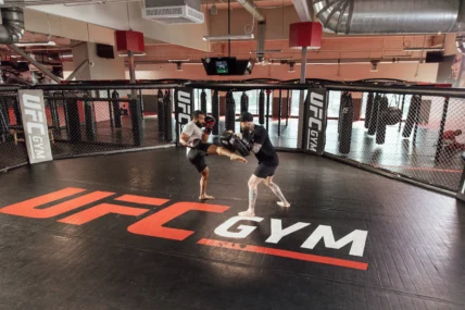 a workout at UFC Gym in the octagon
