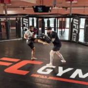 a workout at UFC Gym in the octagon
