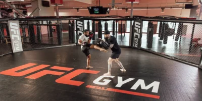 a workout at UFC Gym in the octagon