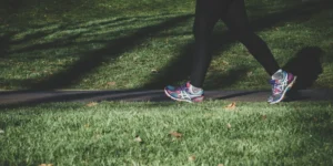 a person walking with sneakers on