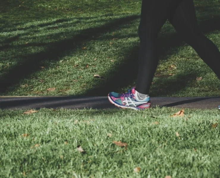 a person walking with sneakers on