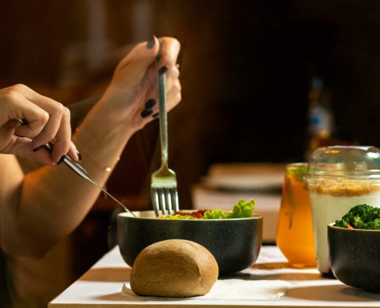 a woman eating a salad